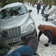 Image for article titled Ten Things To Do If Your Car Is Stuck In A Snow Storm